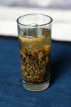Gu Hua Cha infusion glass of water