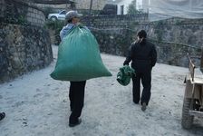 Wang Bing and his wife looking maocha