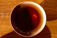 Liqueur d'un puerh <span class='translation'>(Pu Er tea)</span> affiné