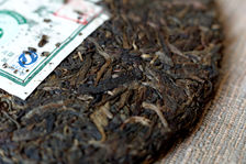 Galette de puerh <span class='translation'>(Pu Er tea)</span> vert dans le Yunnan