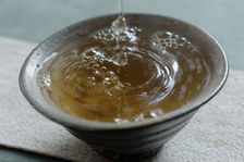 Liqueur d'un jeune puerh <span class='translation'>(Pu Er tea)</span> vert