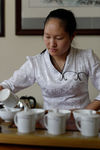 Vendeuse et producteur de thé (Kucong Shan Zhai) à Pu Er