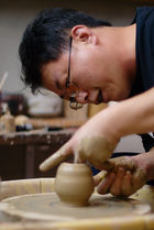 Lin Jianhong dans son atelier