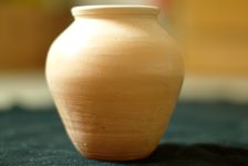  wet surface of a jar filled with water to puerh