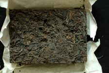 Thé puerh <span class='translation'>(Pu Er tea)</span> compressé en forme de brique (zhuan cha)