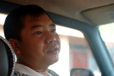  Mr Luo Hou You on the road from the villages of Ailao