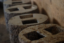  Stones used to compress puerh <span class='translation'>(Pu Er tea)</span> cakes, in Wang Bing