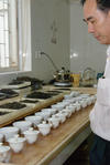 Chen Sheng He in the mixing room plant Sheng Chen